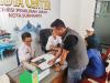 Setyo Puji, Anggota Bawaslu Kota Surakarta saat melakukan pengawasan pemutakhiran data partai  politik yang dilakukan oleh KPU Kota Surakarta
